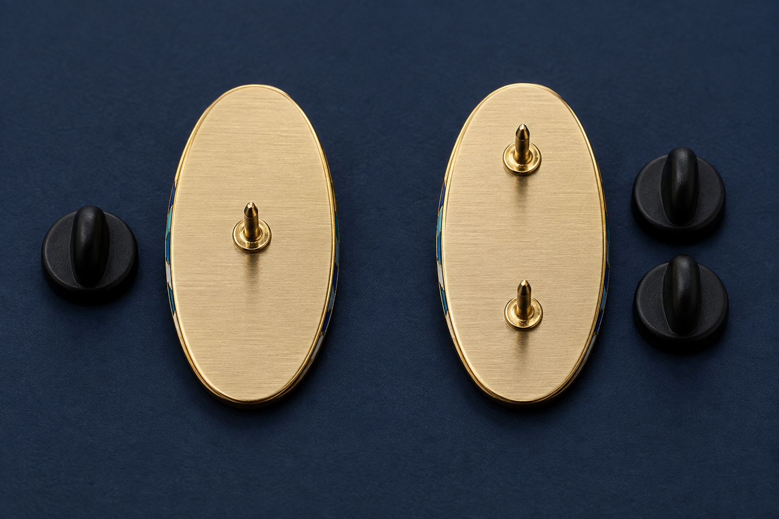 Matching elongated pin backs comparing one central post with two spaced posts