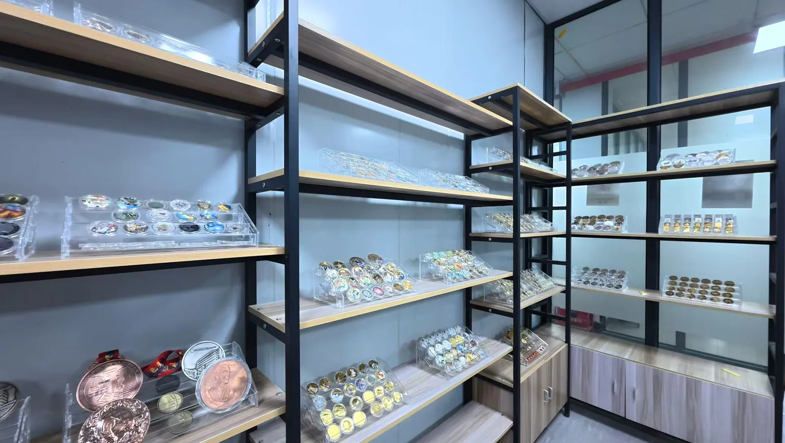 Metal product samples displayed in a factory showroom