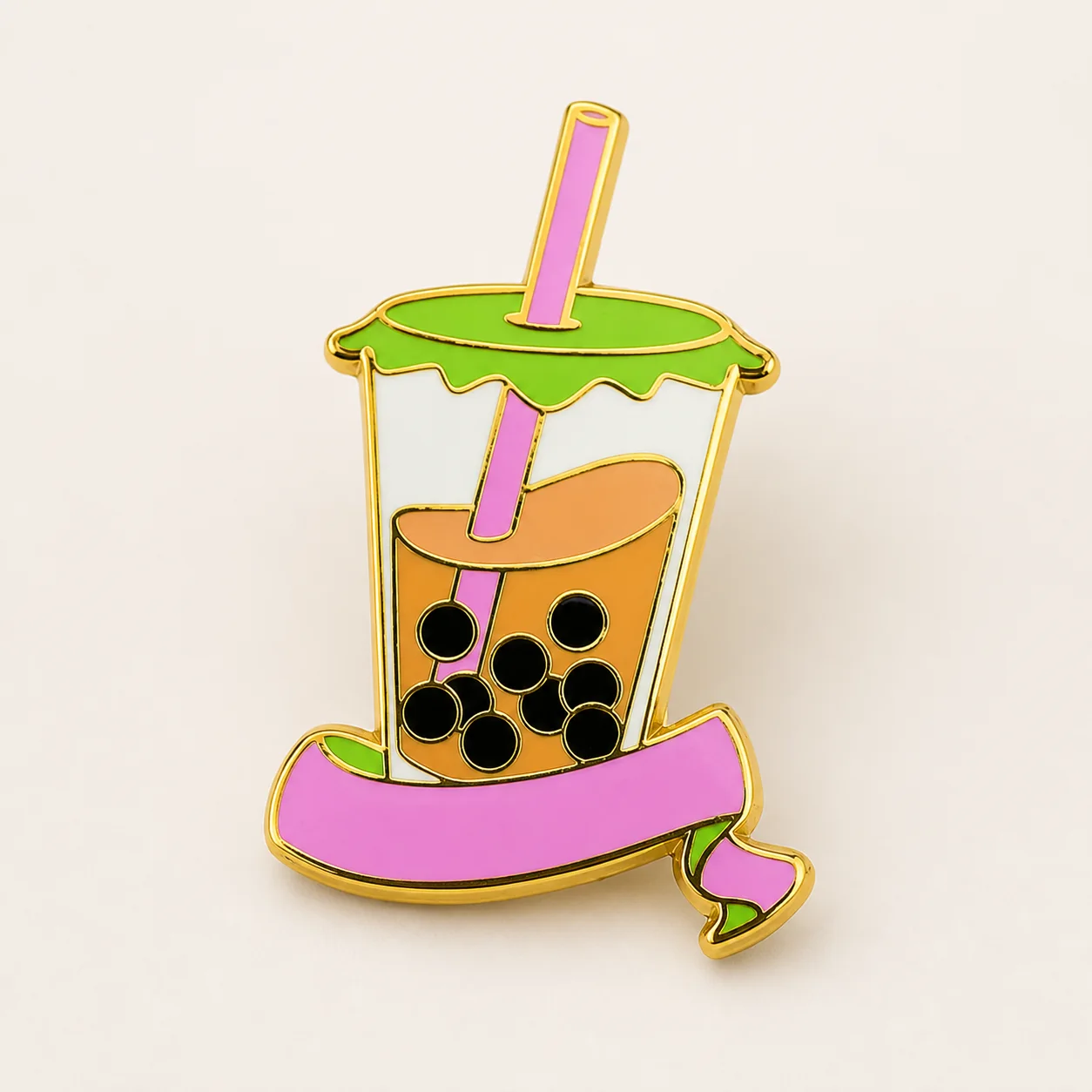 Soft enamel pin with raised gold borders and recessed color